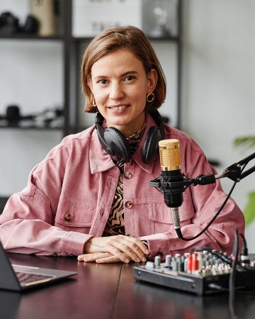 female-podcaster-smiling-2021-12-09-20-28-02-utc.jpg
